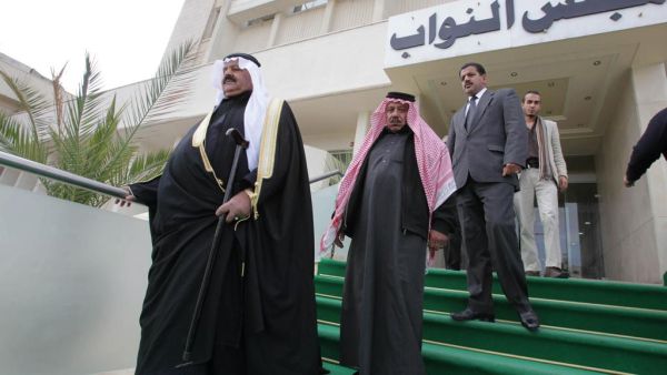 Jordanian MPs leave the parliament building in Amman. (Khalil Mazraawi / AFP Photo)