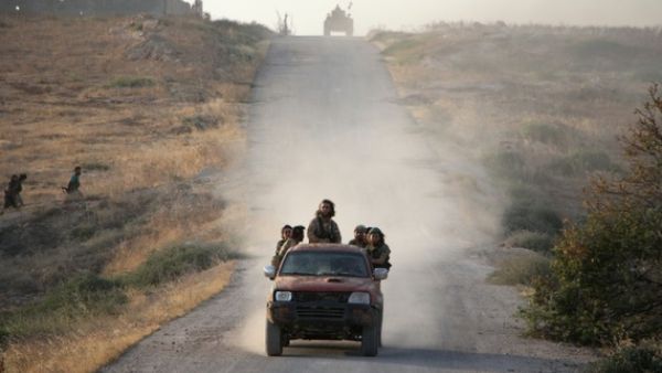 Jund al-Aqsa fighters near Hama, Syria (AFP/Omar Haj Kadour)