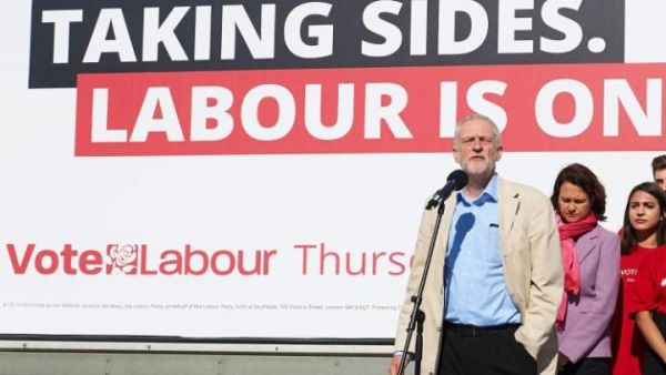 Labour leader Jeremy Corbyn speaks at a party event (Niklas Halle'n / AFP)
