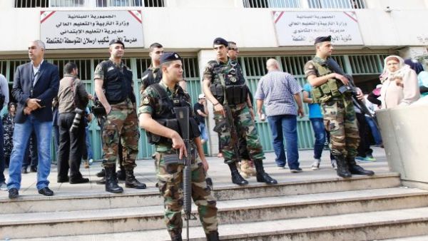 Lebanese security forces guard a polling station in Beirut on May 8. (AFP/File)