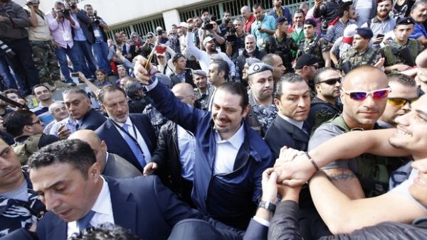 Saad Hariri takes a selfie as he leaves a polling station after voting for the municipal elections. (AFP/ File Photo)