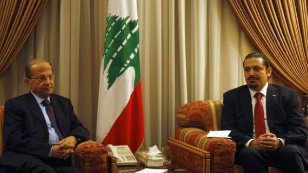 Prime Minister-designate Saad Hariri (R) and President Michel Aoun (L). (AFP/ File Photo)