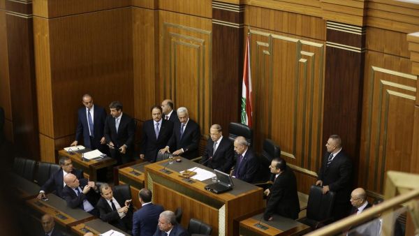 Lebanese President Michel Aoun (C) waits next to the Parliament Speaker Nabih Berri (R) at the Lebanese parliament in Beirut. (Joseph Eid / AFP)