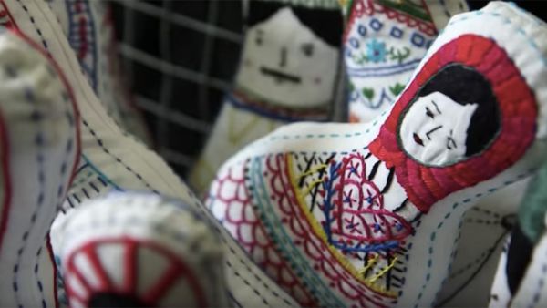 The women who make the dolls hope that giving the dolls a personal story will help people see the individuals struggling through Syria's war. (YouTube/Euronews)