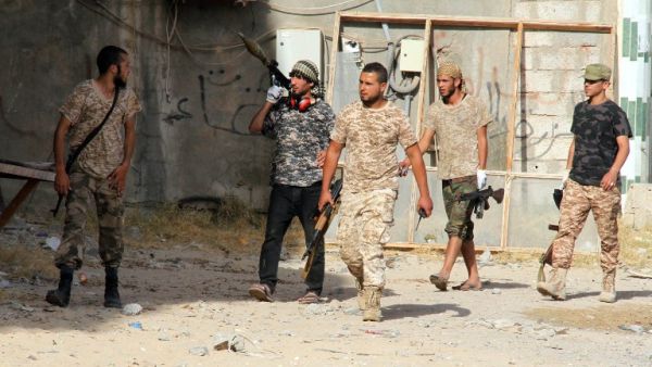 Forces loyal to Libya's UN-backed unity government patrol the city of Sirte, 450 kilometres (280 miles) east of Tripoli, during an operation to recapture the city from the Islamic State (IS) Jihadists, on June 12, 2016. (AFP/Stringer)