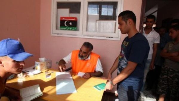 Libyans register to vote in the upcoming legislative elections in Tripoli. (AFP/ File Photo)