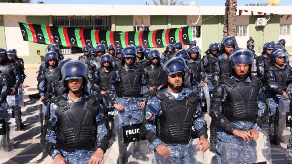 Members of the Libyan judicial police pose after a graduation ceremony. (AFP/Mahmud Turkia) Members of the Libyan judicial police pose after a graduation ceremony. (AFP/Mahmud Turkia)