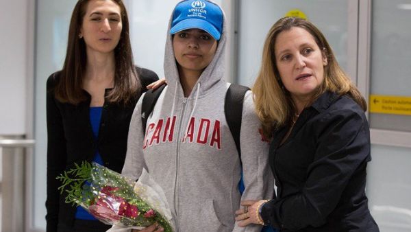 Saudi Rahaf Mohammed al-Qunun is welcomed by Canadian Minister for Foreign Affairs Chrystia Freeland as she arrives at Pearson International airport in Toronto, Ontario, on January 12, 2019. (AFP)
