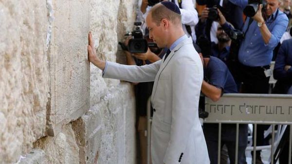 Britain's Prince William on the Western Wall, the holiest site where Jews can pray, in Jerusalem's Old City during his five-day visit to the region in which he visited Jordan, Israel and the Occupied West Bank. (AFP/ File)