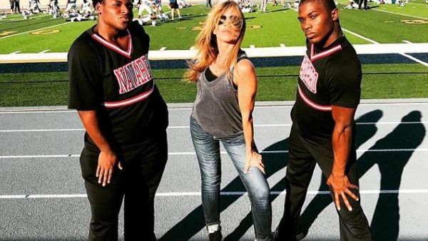 Before graduating, LaDarius earned a cheer scholarship to Navarro, a junior college in Texas. He is pictured here with a teammate and his coach  (Instagram)