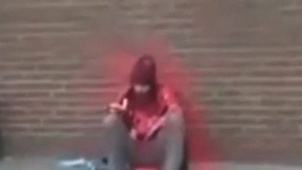 Homeless Man Sprayed with Red Paint (Facebook)