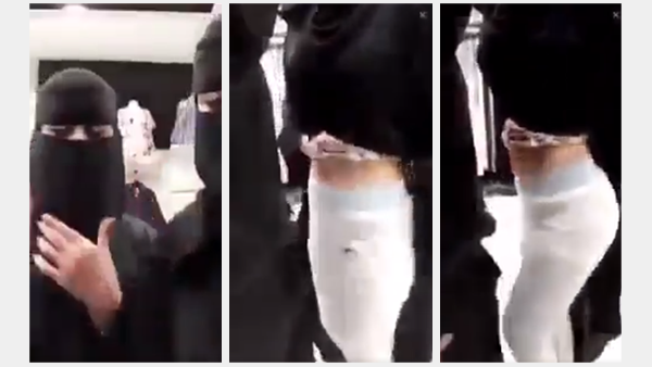 A screenshot from the video shared among Saudis for two Saudi women, one of them reveals part of her waist in the video.