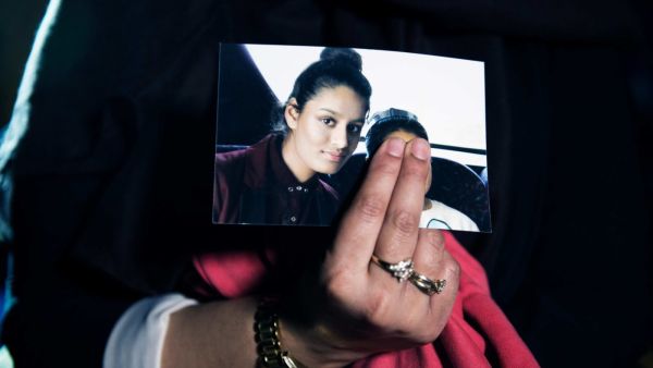 Shamima Begum is seen in a photo held by her sister. (AFP)
