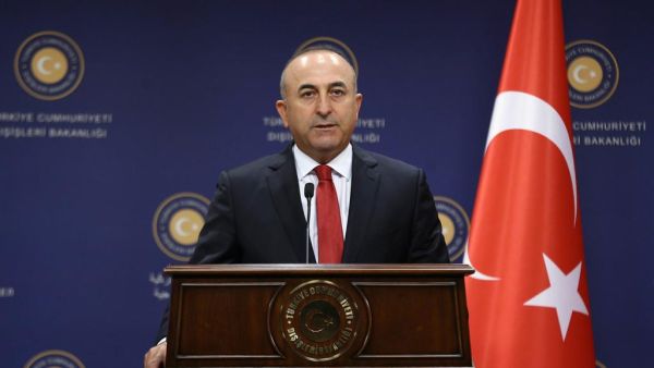 Turkish Foreign Minister Mevlut Cavusoglu gives a press conference in Ankara on July 25. (AFP)