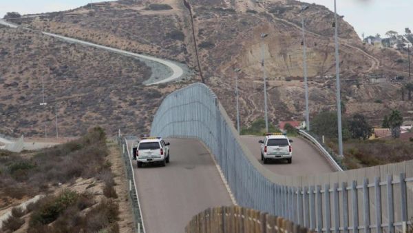 Border patrol agents patrolling the United States-Mexico border wall (AFP/File Photo)
