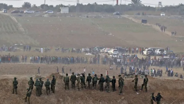 Israeli soldiers taking position during clashes with Palestinian protesters across the border. (Jack GUEZ / AFP)
