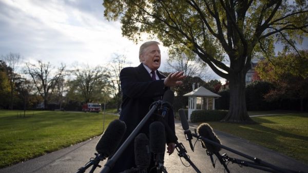 US President Donald Trump speaks as he departs the White House in Washington, DC, on November 20, 2018. (Jim WATSON / AFP)