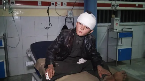 A young wounded Afghan boy receives treatment at Wazir Akbar Khan hospital in Kabul on November 28, 2018. (AFP/File)