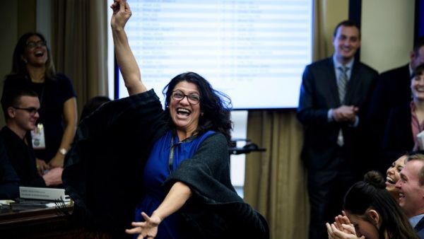 US Representative-elect Rashida Tlaib (D-MI) reacts to a good number during an office lottery for new members of Congress on Capitol Hill November 30, 2018 in Washington, DC. 
Brendan Smialowski / AFP