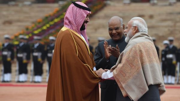 India's President Ram Nath Kovind (C) looks on as Saudi Crown Prince Mohammed bin Salman (L) and India's Prime Minister Narendra Modi shake hands in New Delhi. (AFP/ File Photo)