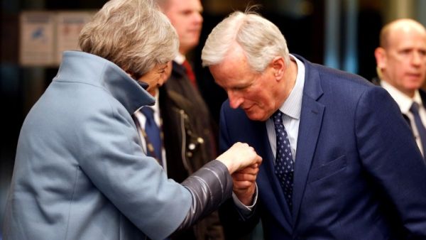 European Union's chief Brexit negotiator Michel Barnier welcomes British Prime Minister Theresa May prior to their meeting in Strasbourg, on March 11, 2019. (AFP/ File Photo)