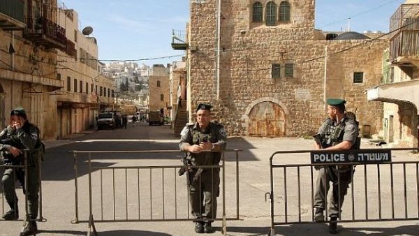 Border Policemen on guard in Hebron. (AFP/Hazem Bader)