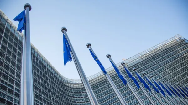 EU flags in front of the European Commission headquarters at the Berlaymont Building in Brussels. (AFP/File)