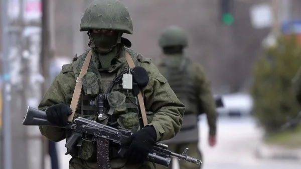 Russian soldiers patrol outside the navy headquarters in Simferopol. (AFP/ File Photo)