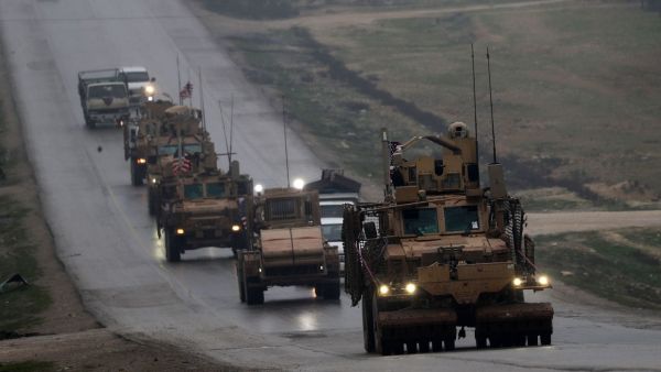 A convoy of U.S. military vehicles near Syria's northern city of Manbij on Dec. 30, 2018.. (AFP)