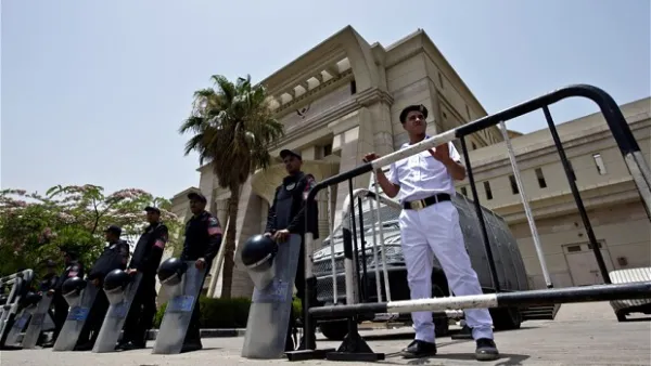 Egyptian riot policemen stand guard outside the constitutional court in Cairo. (AFP/File)