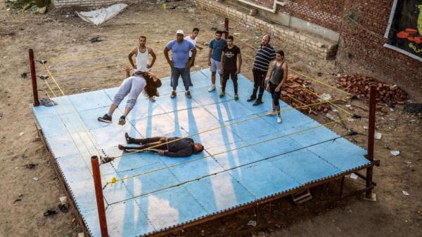 Egypt's wrestling federation started off with just eight fighters in 2012 and now has 50 amateurs from across the country. (AFP)