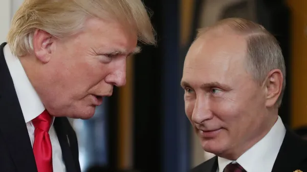 U.S. President Donald Trump chats with Russia's President Vladimir Putin as they attend the APEC Economic Leaders' Meeting. (AFP/File)