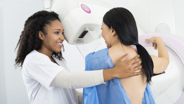 Doctor Assisting Woman Undergoing Mammogram X-ray Test. (Shutterstock/ File Photo)