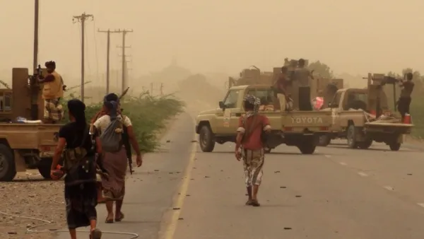 Yemeni pro-government forces gather at the south of Hodeidah airport on June 15, 2018. (AFP/File)