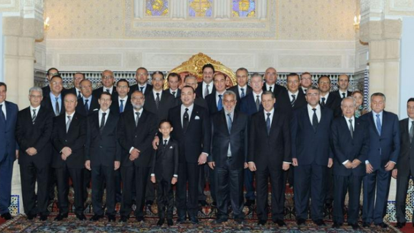 A picture taken at the royal palace in Rabat shows Moroccan King Mohammed VI (first row C) and crown prince Moulay Hassan posing for a family picture of the new government led by moderate Islamist Prime Minister Abdelilah Benkirane. (AFP/Azzouz Boukallouch)