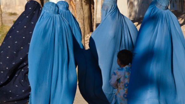Women wearing the full burqa covering in Herat, Afghanistan (Wikimedia Commons)