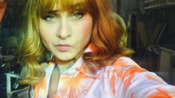 Nelly sported short blond hear and thick bangs which made her look much younger (Source: Nelly Karim -
 Instagram)