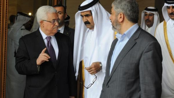 Head of the movement's politburo Khalid Mashaal, his deputy Ismail Haniyeh and President Abbas met in Qatar on Thursday, at the home of Qatar's Minister of Foreign Affairs Muhammad Bin Abed al-Rahman al-Thani. (AFP/File)