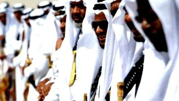 A row of sword-wielding Saudi men in the sun. (AFP/File)