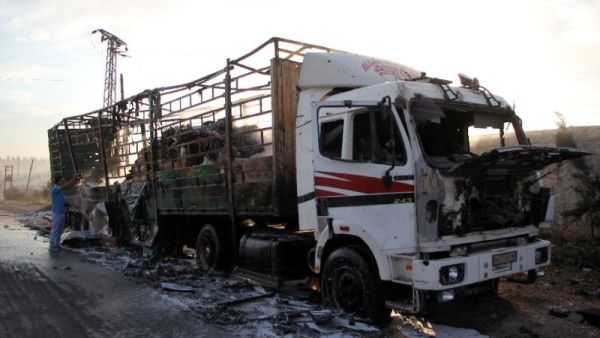 The UN said at 18 trucks in the 31-vehicle humanitarian aid convoy were destroyed. (AFP/File)