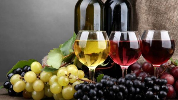 Integration is so much sweeter with a decent glass of red. (File photo)