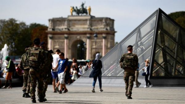 Soldiers patrol around the Louvre Museum in Paris on September 10, 2016. (AFP/File)