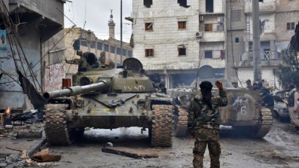 Syrian government forces patrol the northern city of Aleppo. (AFP/File)
