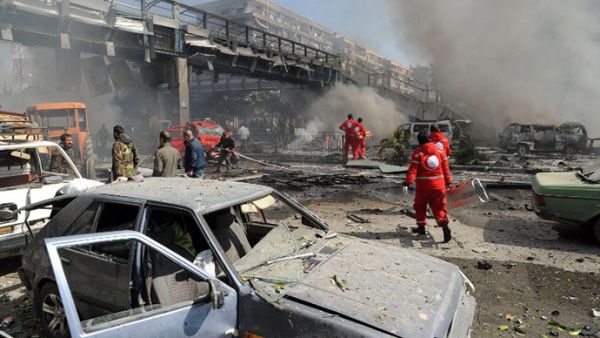 The aftermath of a powerful car bomb explosion near the headquarters of Syria's ruling Baath party. (AFP/File)