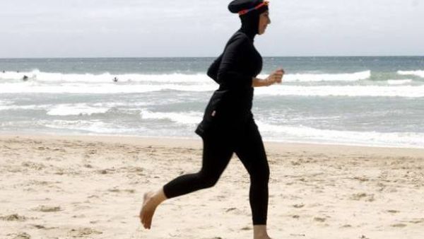 France already has laws in place to prohibit wearing a full-face veil in public or a headscarf in public primary and high schools. (AFP/File)