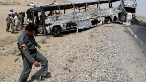 In April 2013 a bus hit a wrecked fuel tanker in the southern province of Kandahar. (AFP/File)