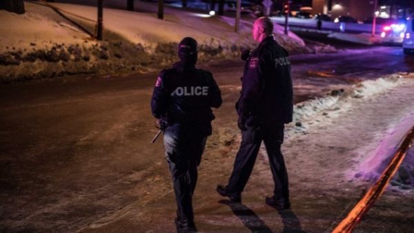 Canadian police officers patrol after a shooting in a mosque at the Québec City Islamic cultural center. (AFP/File)