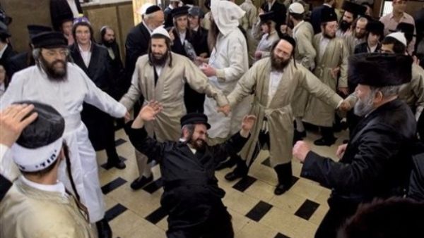 Rabbis and ultra-orthodox jews dancing. (YouTube)