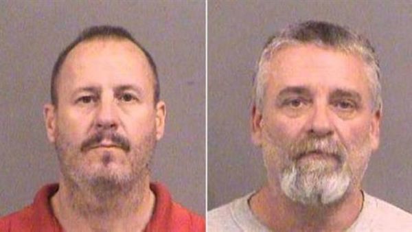 This photo released by police shows Curtis Allen (L) and Gavin Wright who are reported to be part of a militia group called the Crusaders, which first drew the FBI's attention last February.