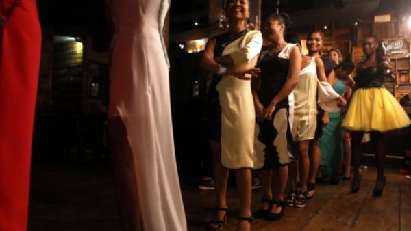 Domestic workers take part at a modelling show in central Beirut organised by local NGO Insaan. (AFP/File)
